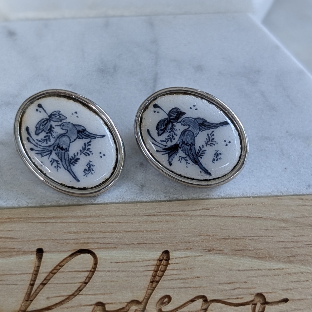 Elegant Silver and White Bird Motif Earrings